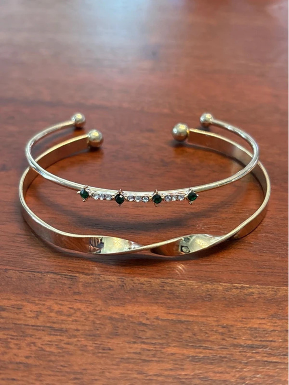 Two gold bangles.